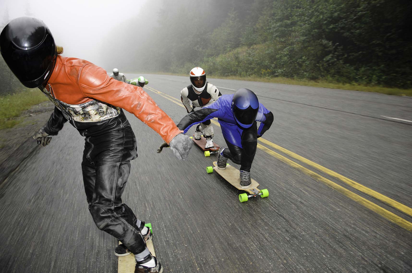 longboarders on road