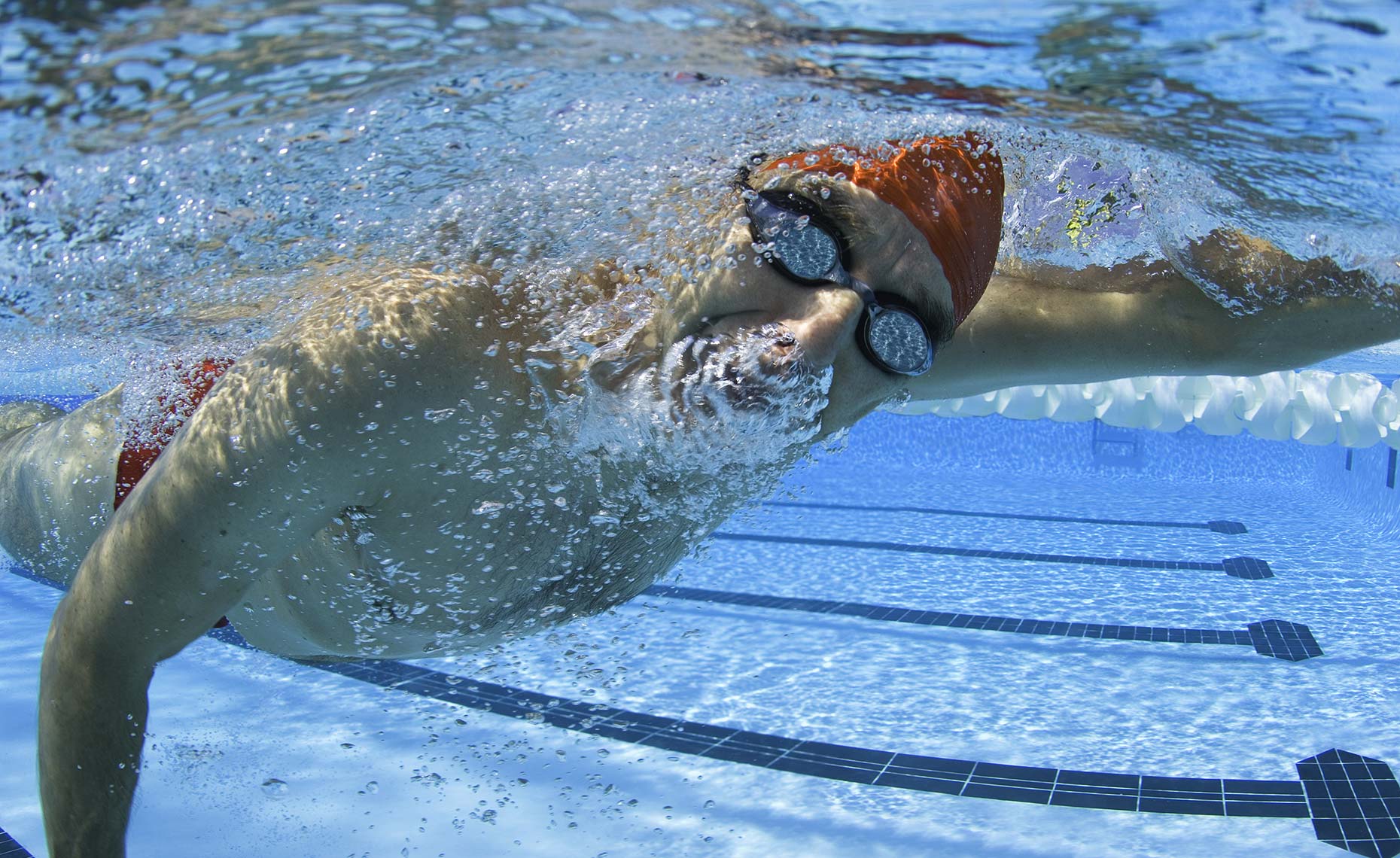mature swimmer underwater view