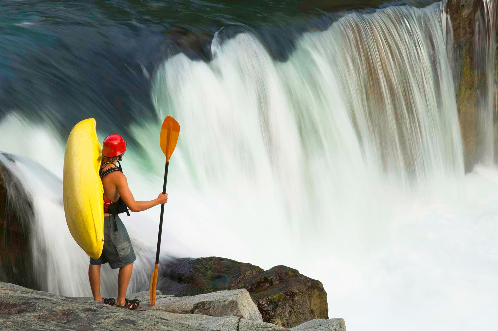Whistler kayaker by waterfalls