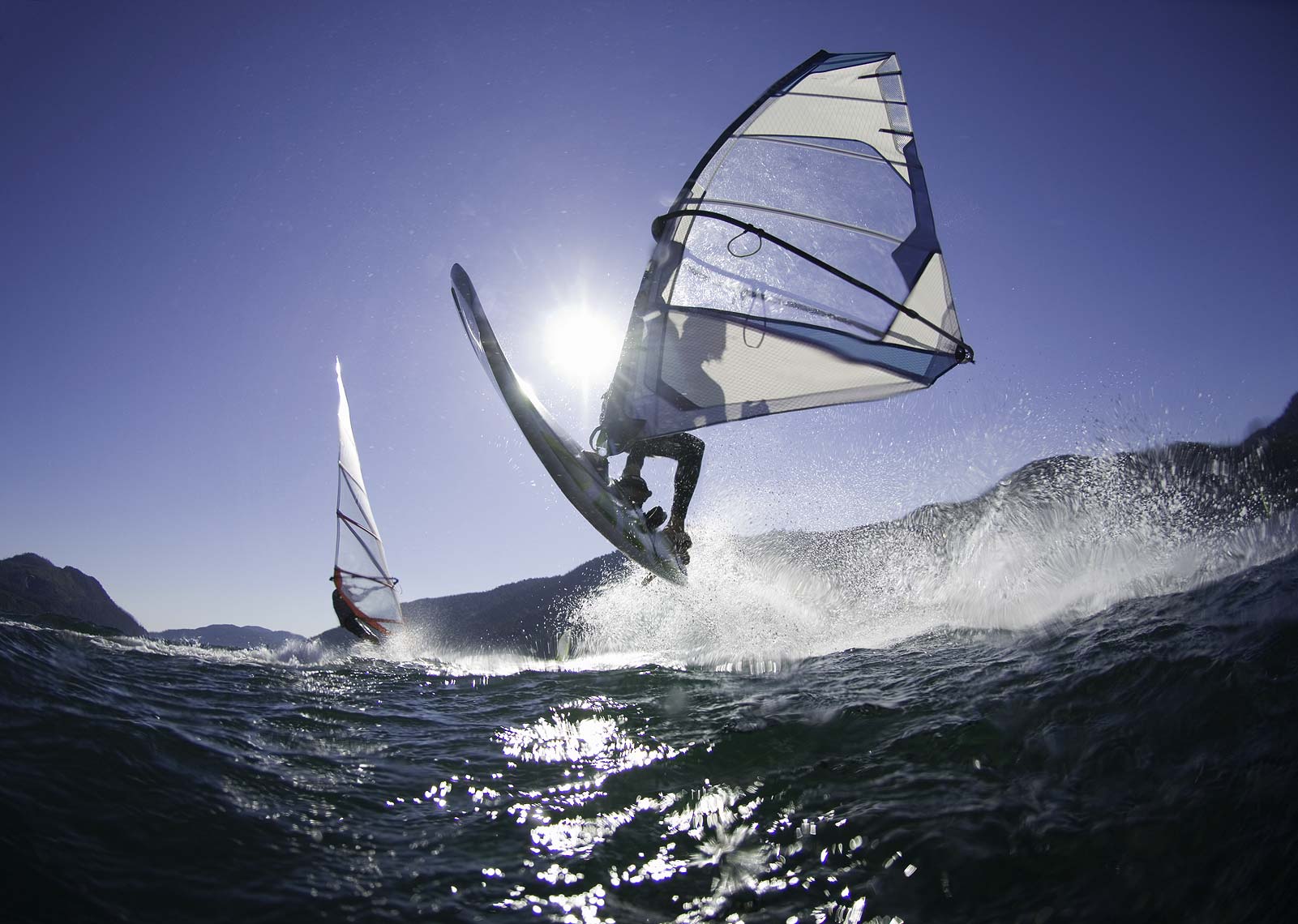 windsurfer jumping